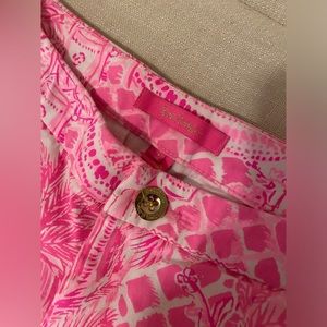 Lilly Pulitzer buttercup pink scalloped shorts.